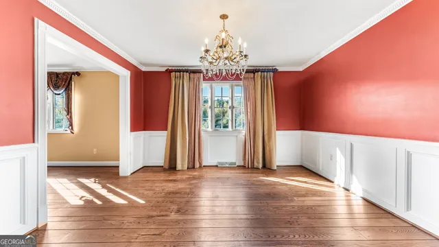 a view of entryway with wooden floor