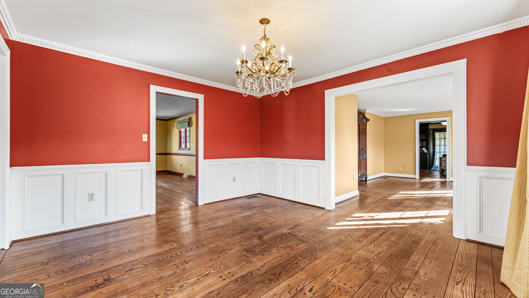 8876 Cave Springs Road Cave Spring, GA 30124 - Photo 9 of 36 wooden floor in an empty room with a window