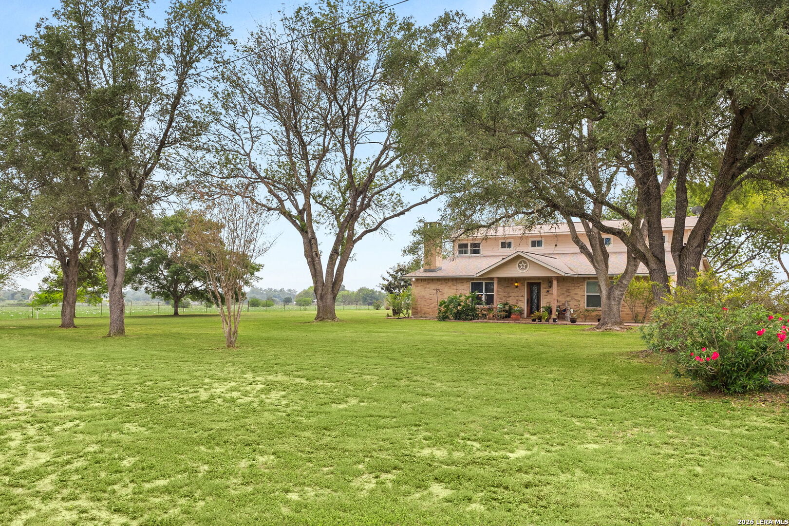 350 Ullrich Road Marion, TX 78124 - Photo 2 of 43 a front view of a house with a yard and trees