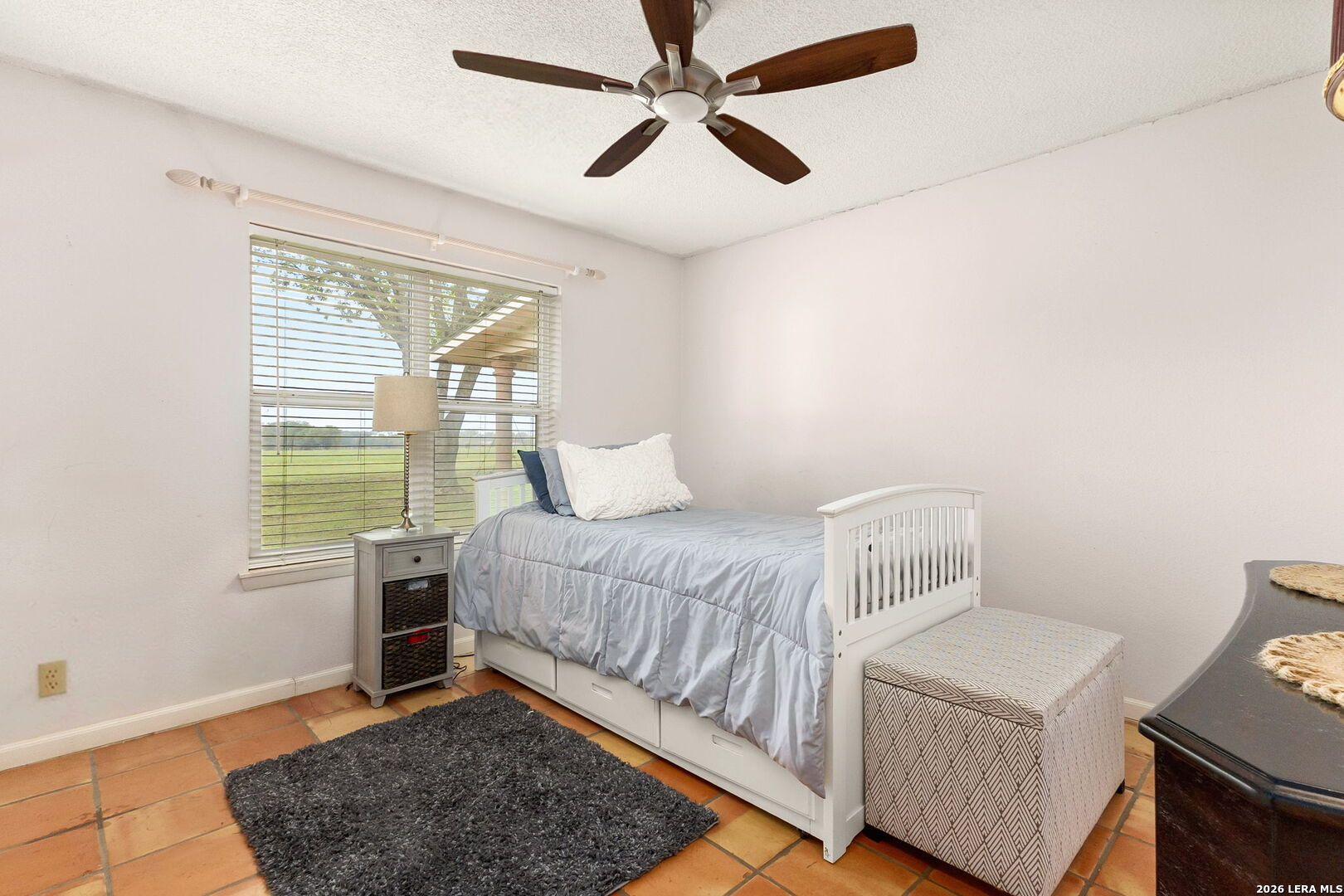 350 Ullrich Road Marion, TX 78124 - Photo 24 of 43 a bedroom with a bed and a window in it