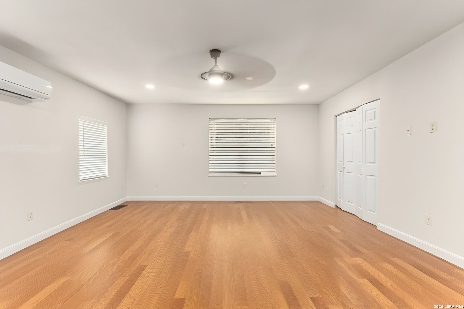 350 Ullrich Road Marion, TX 78124 - Photo 26 of 43 wooden floor in an empty room with a window