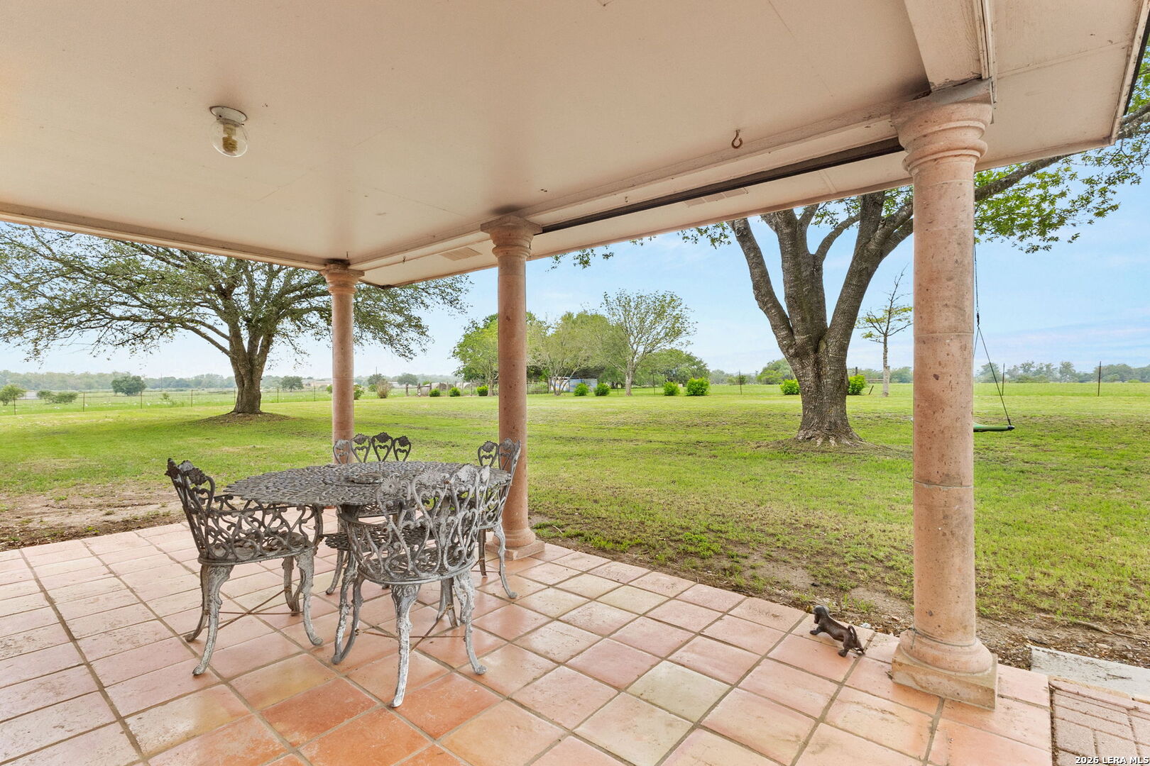 350 Ullrich Road Marion, TX 78124 - Photo 30 of 43 a view of a porch with chairs and yard