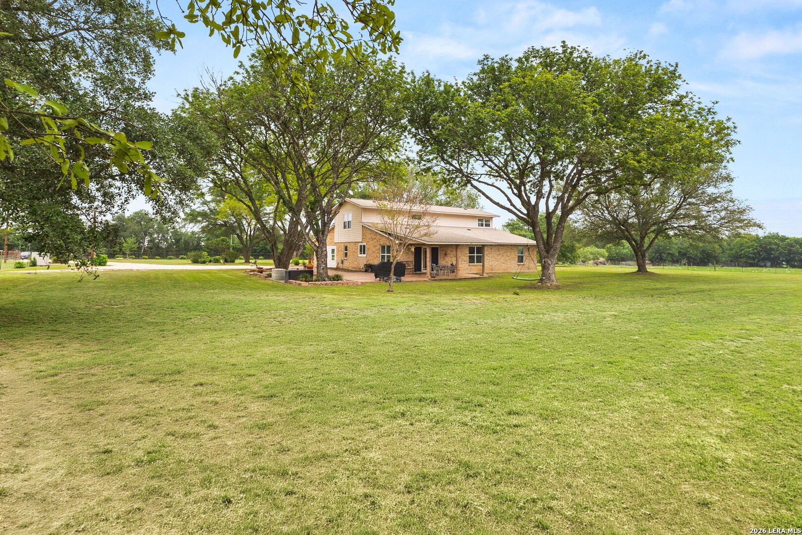 350 Ullrich Road Marion, TX 78124 - Photo 3 of 43 a view of a pool with an outdoor space and seating area