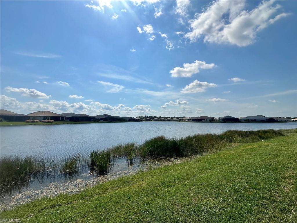 3998 Perseus Street Naples, FL 34120 - Photo 19 of 26 Water view with nearby suburban area