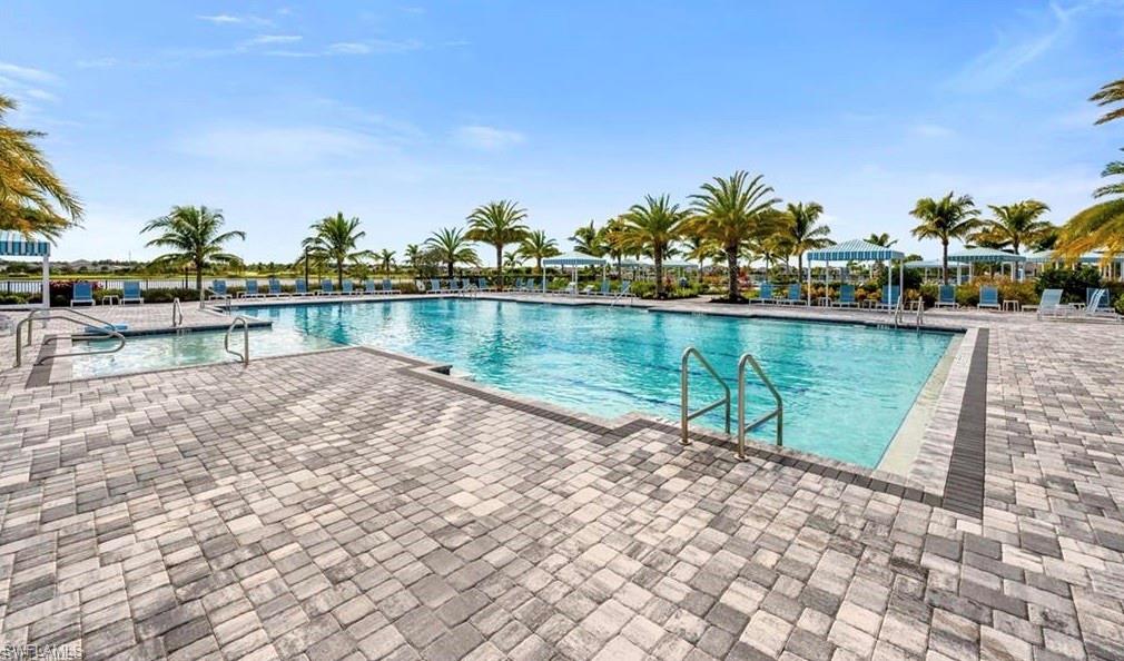 3998 Perseus Street Naples, FL 34120 - Photo 20 of 26 Community pool featuring a patio