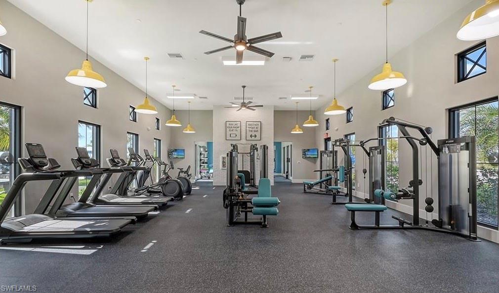 3998 Perseus Street Naples, FL 34120 - Photo 24 of 26 Gym featuring a high ceiling and a ceiling fan