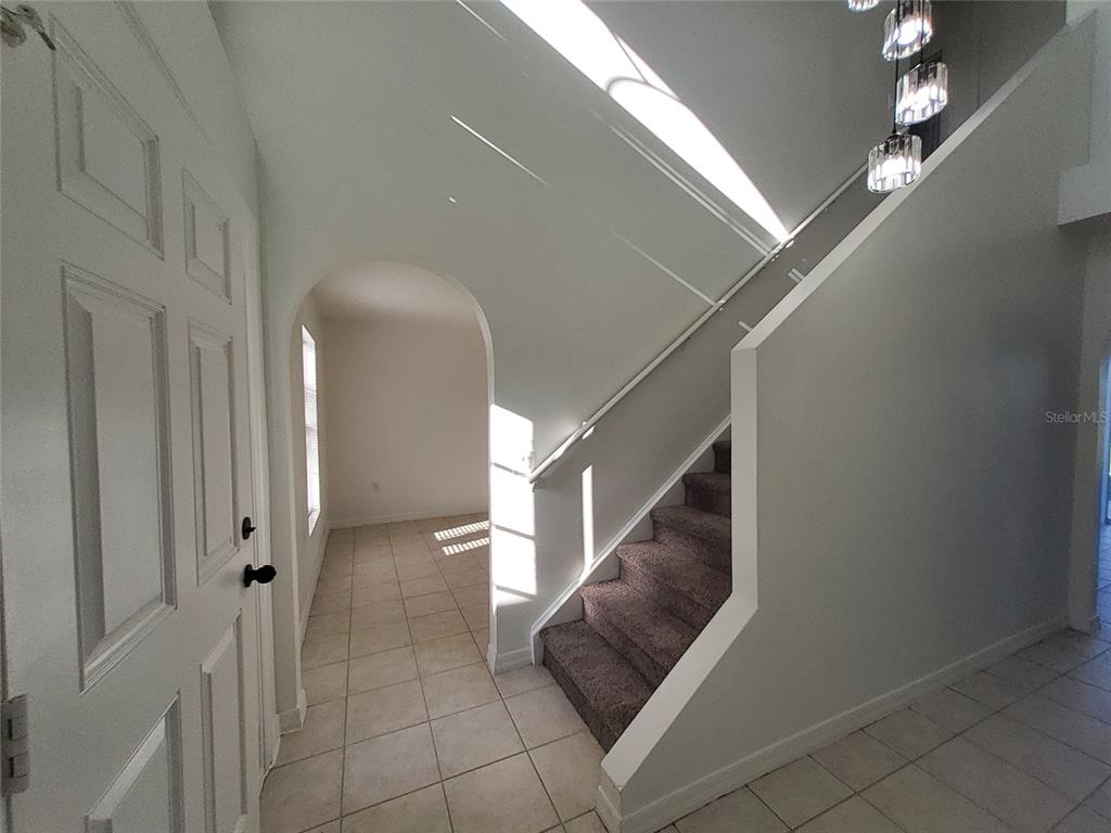 509 Ridges Drive Dundee, FL 33838 - Photo 11 of 33 a view of entryway and hall with a rug