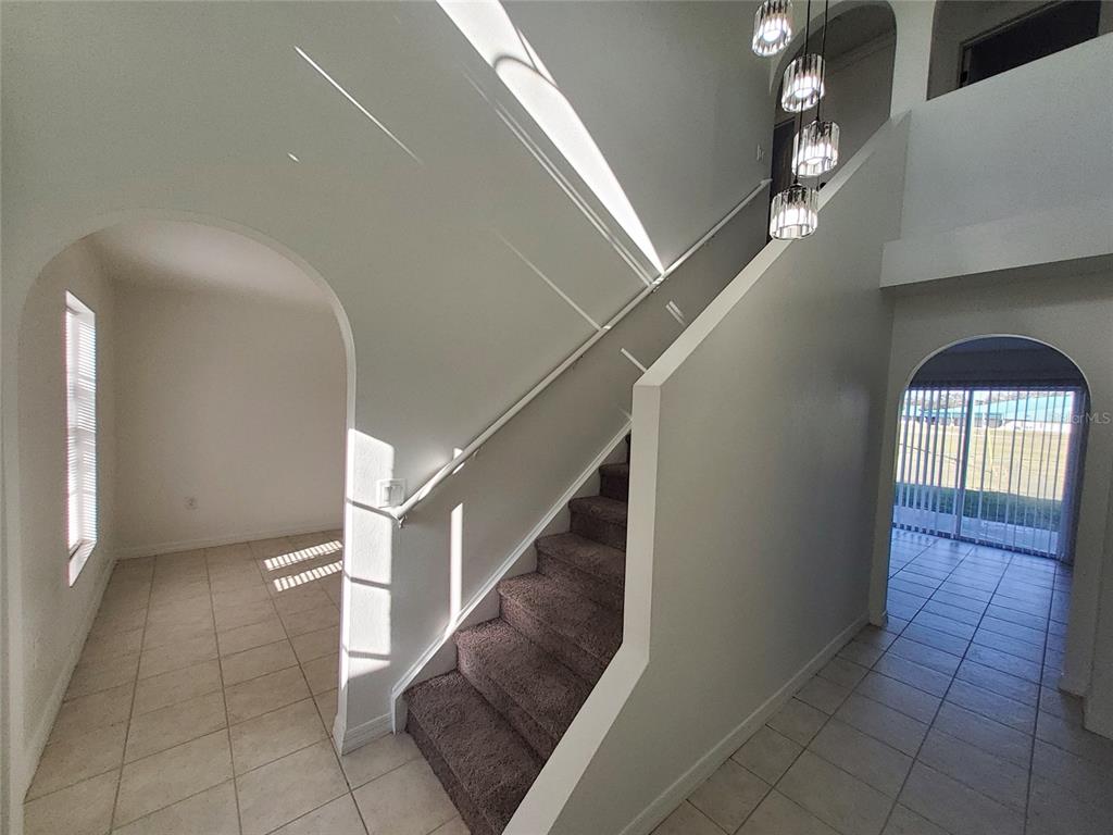 509 Ridges Drive Dundee, FL 33838 - Photo 31 of 33 a view of entryway and hall with a window