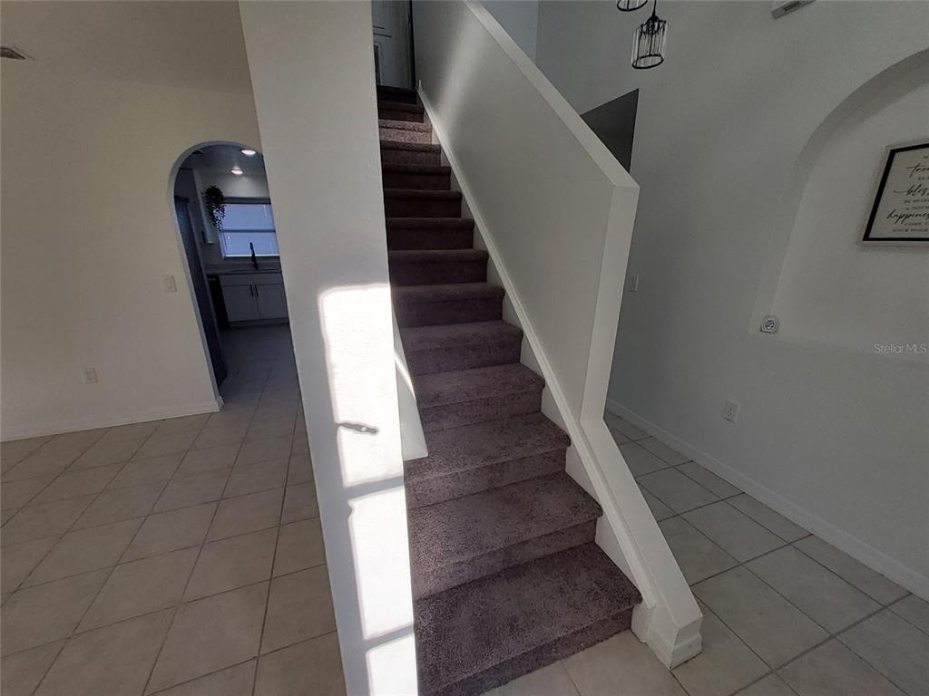 509 Ridges Drive Dundee, FL 33838 - Photo 32 of 33 a view of entryway and hall with wooden floor