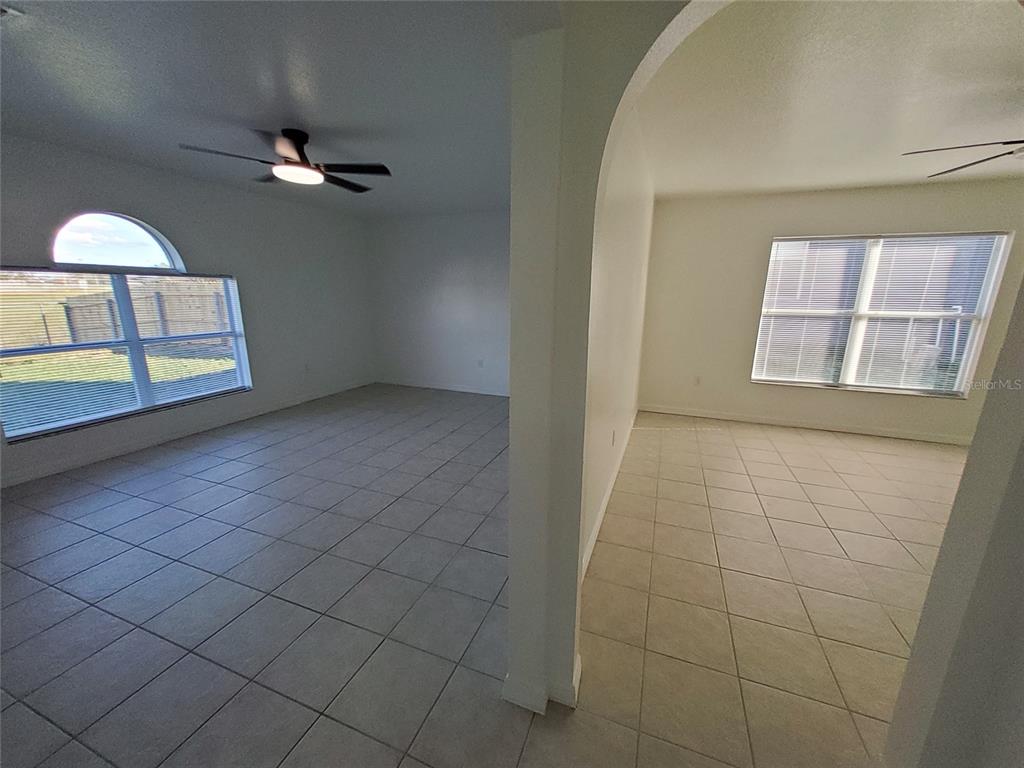 509 Ridges Drive Dundee, FL 33838 - Photo 8 of 33 a view of an empty room with a window