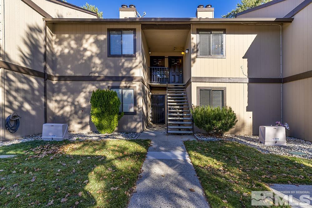 4386 Matich Drive Reno, NV 89502 - Photo 1 of 20 a view of house with backyard space and garden