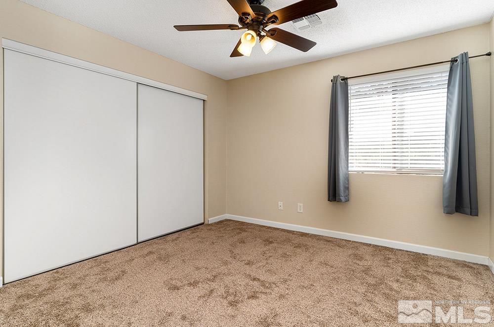 4386 Matich Drive Reno, NV 89502 - Photo 9 of 20 a view of an empty room with a window