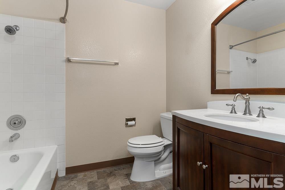 4386 Matich Drive Reno, NV 89502 - Photo 10 of 20 a bathroom with a sink toilet and shower