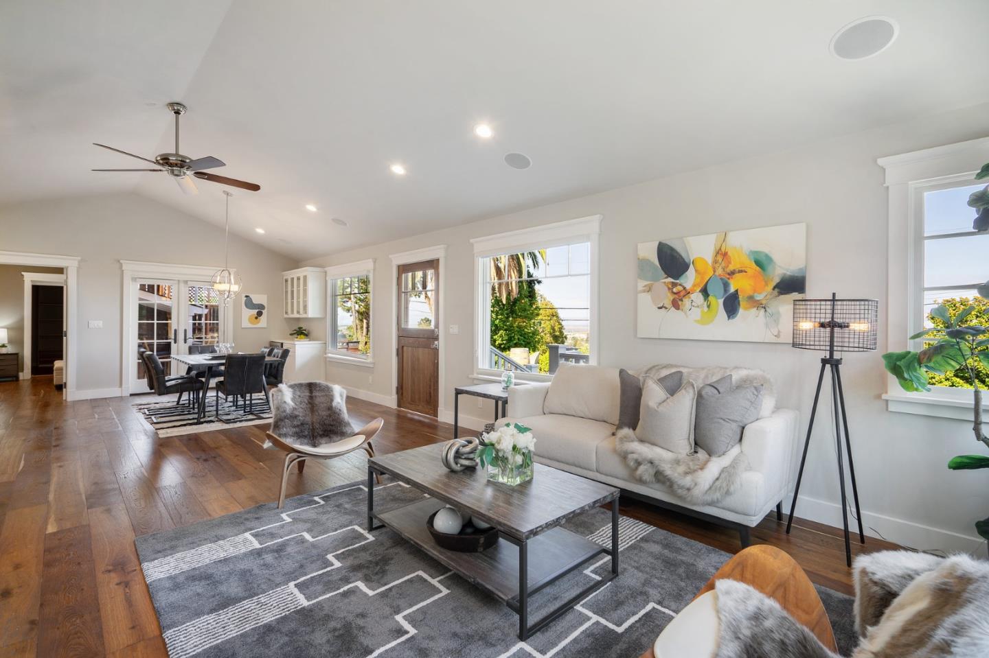 910 Sunset Drive San Carlos, CA 94070 - Photo 11 of 62 a living room with furniture a rug and a chandelier