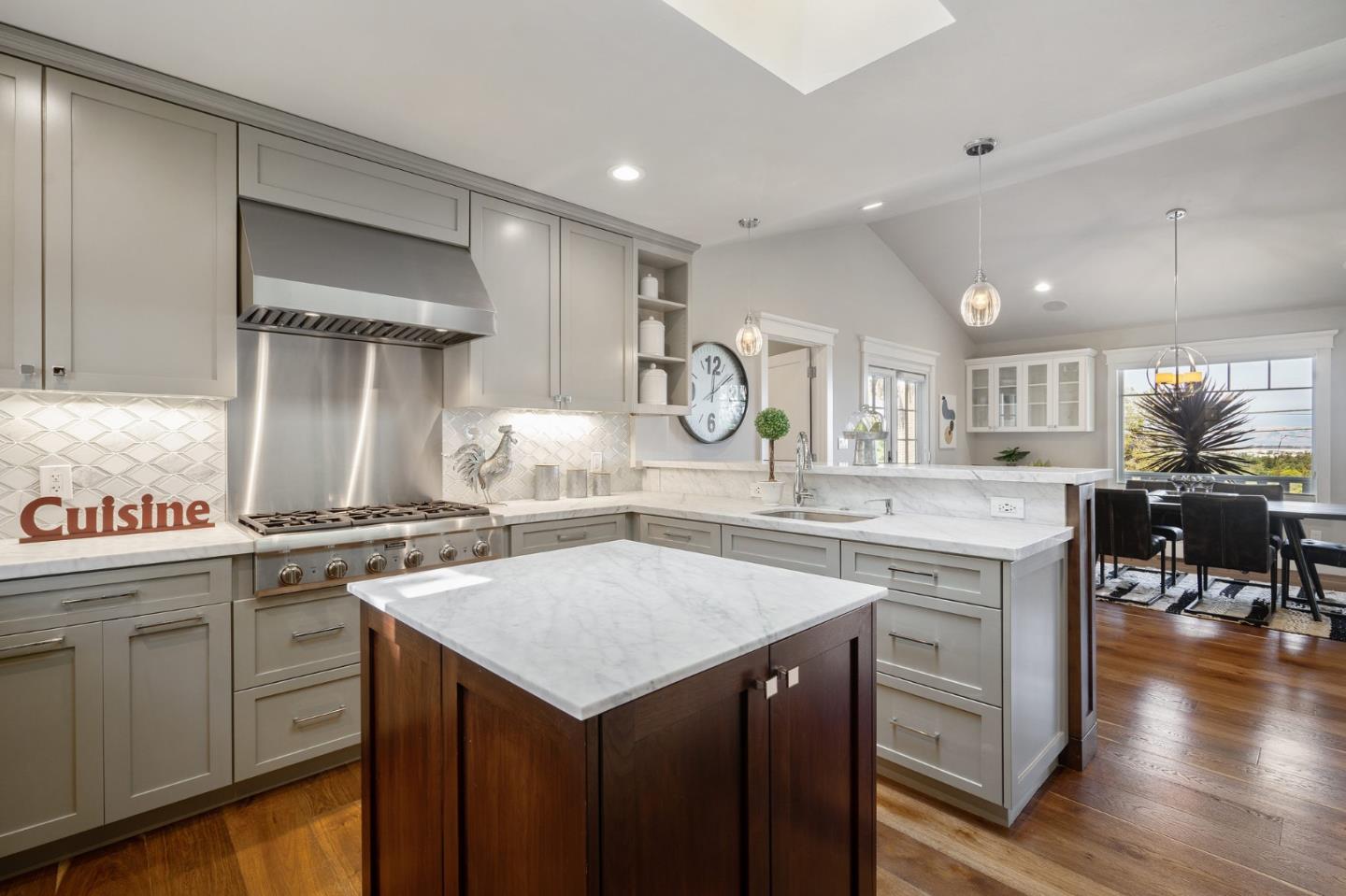 910 Sunset Drive San Carlos, CA 94070 - Photo 17 of 62 a kitchen with a stove a sink and a refrigerator