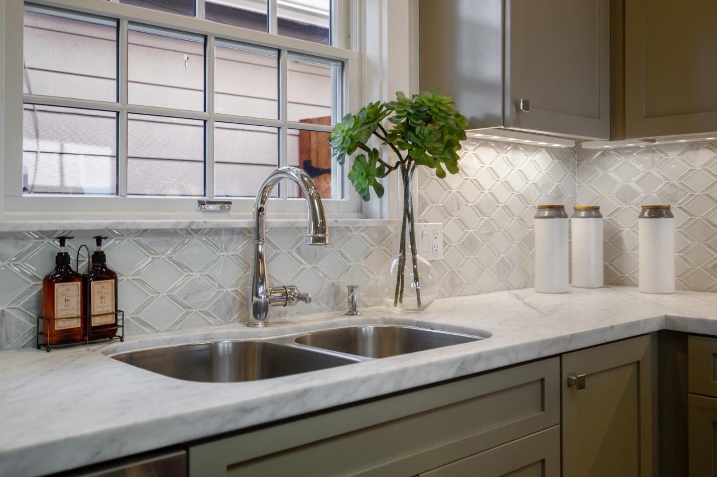 910 Sunset Drive San Carlos, CA 94070 - Photo 20 of 62 a kitchen with a sink and a window