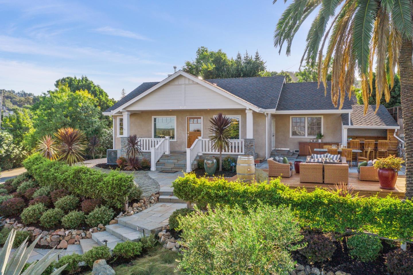 910 Sunset Drive San Carlos, CA 94070 - Photo 2 of 62 a front view of a house with garden