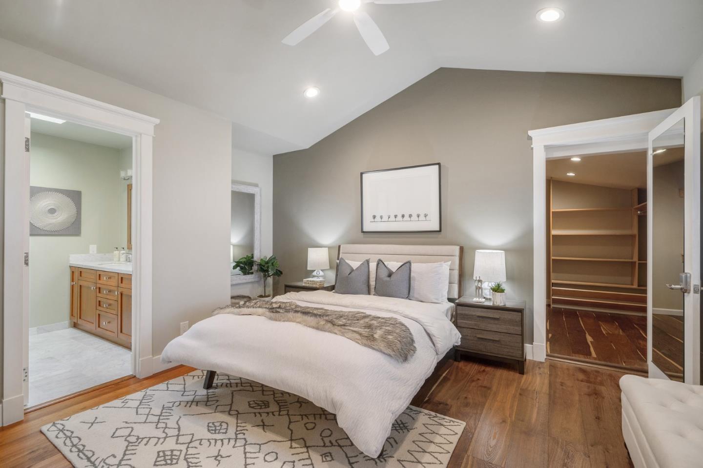 910 Sunset Drive San Carlos, CA 94070 - Photo 21 of 62 a bedroom with a bed and a table