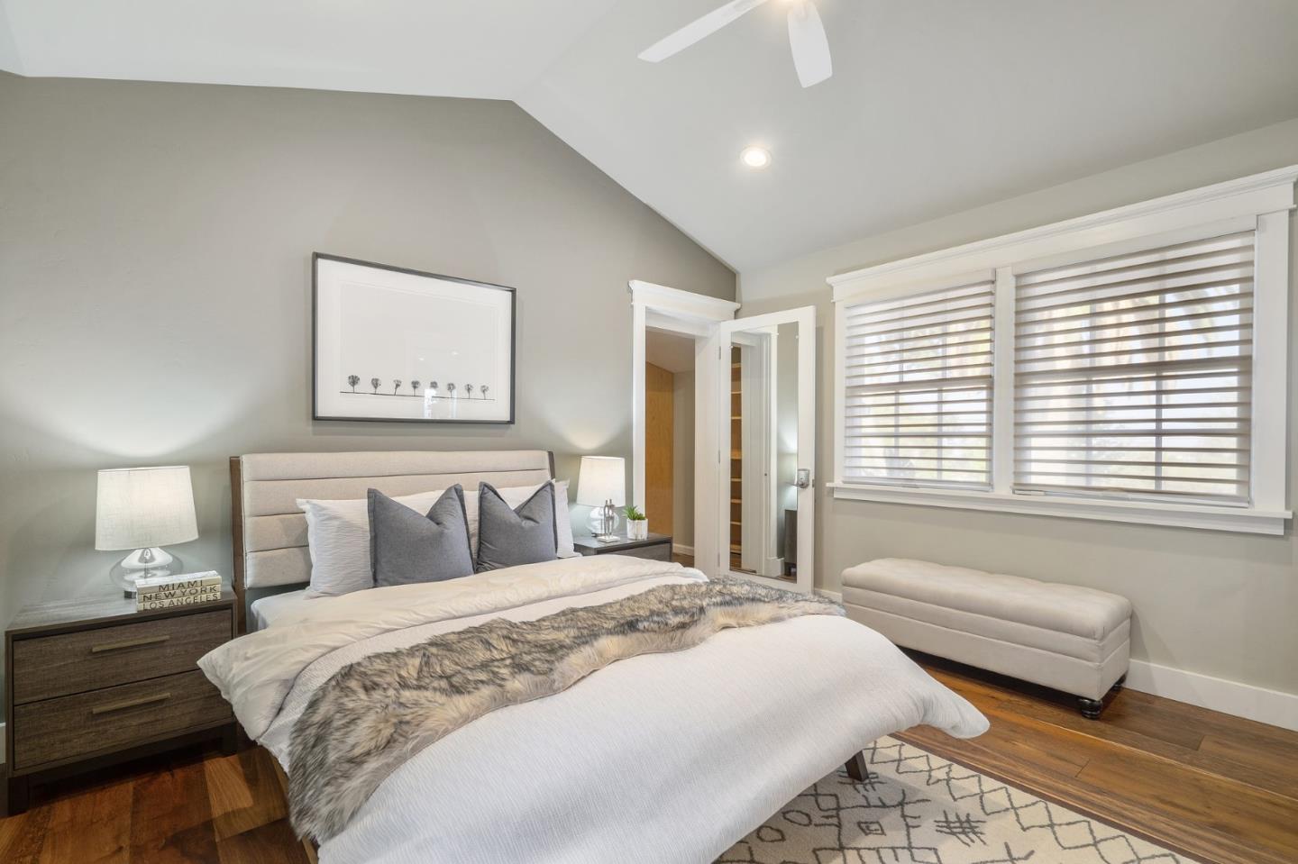 910 Sunset Drive San Carlos, CA 94070 - Photo 23 of 62 a bedroom with a bed and a couch