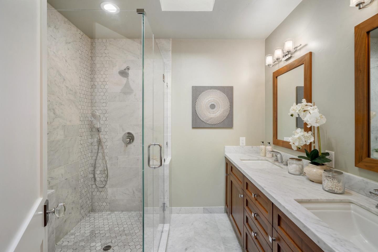 910 Sunset Drive San Carlos, CA 94070 - Photo 24 of 62 a bathroom with a double vanity sink mirror and shower