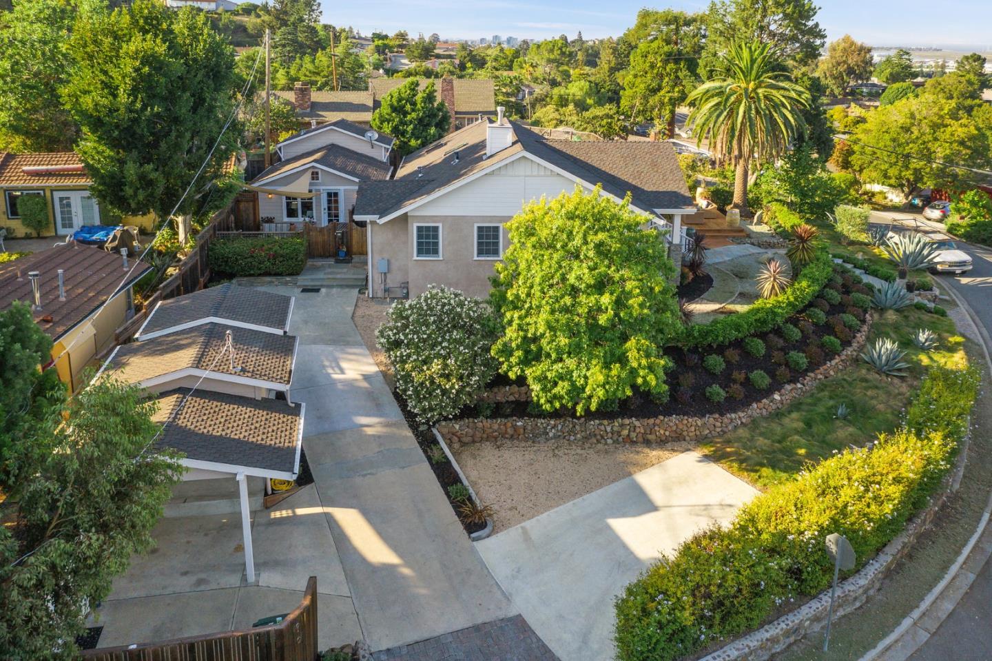 910 Sunset Drive San Carlos, CA 94070 - Photo 4 of 62 a front view of a house with a yard
