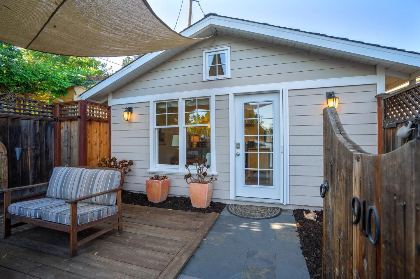 910 Sunset Drive San Carlos, CA 94070 - Photo 41 of 62 a view of a patio with couches and potted plants