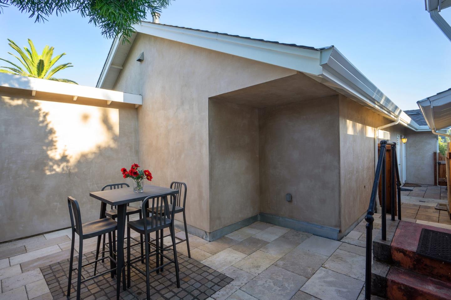 910 Sunset Drive San Carlos, CA 94070 - Photo 53 of 62 a dining room with furniture and a potted plant