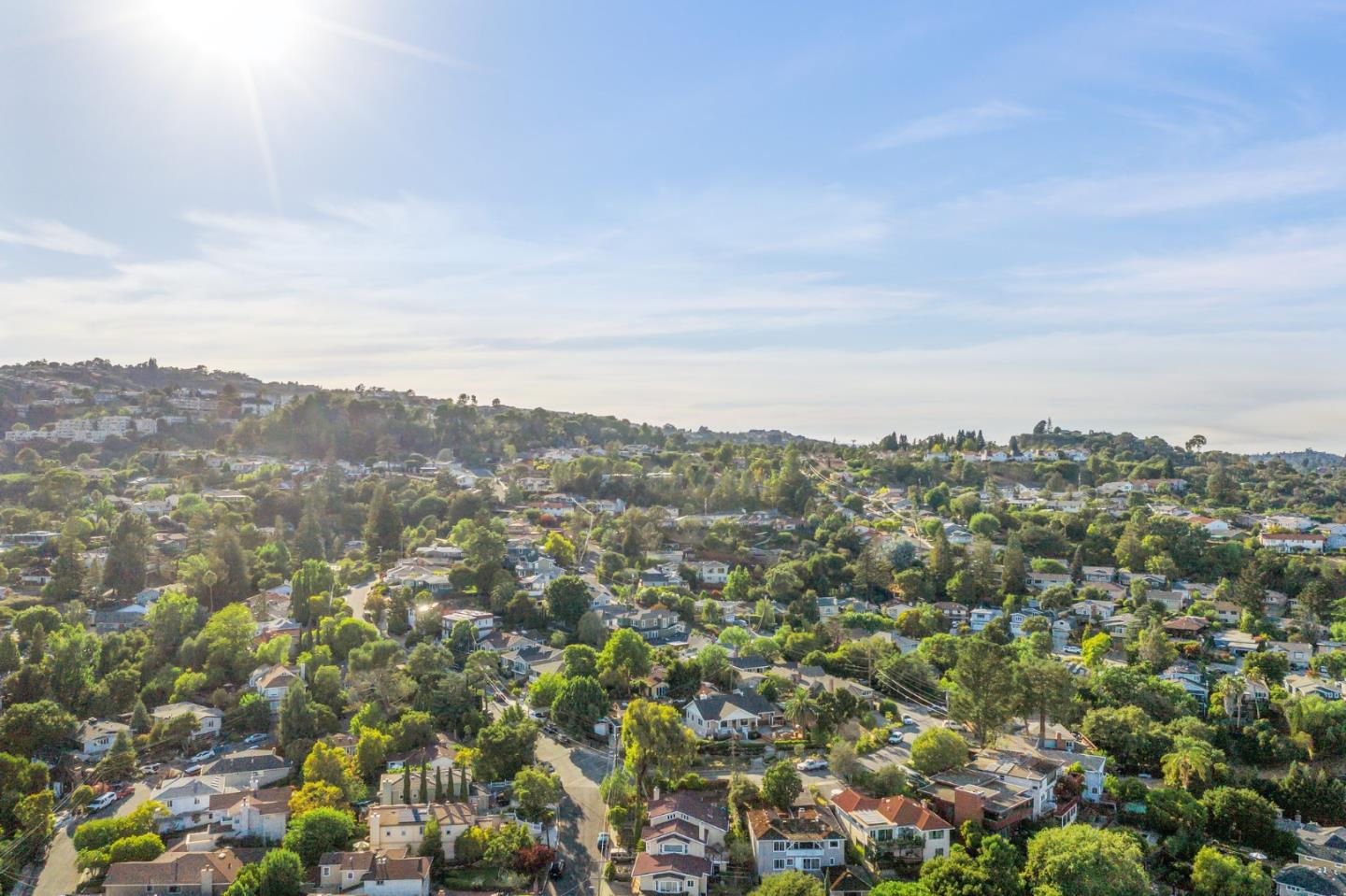 910 Sunset Drive San Carlos, CA 94070 - Photo 59 of 62 an aerial view of residential house with green space and fog