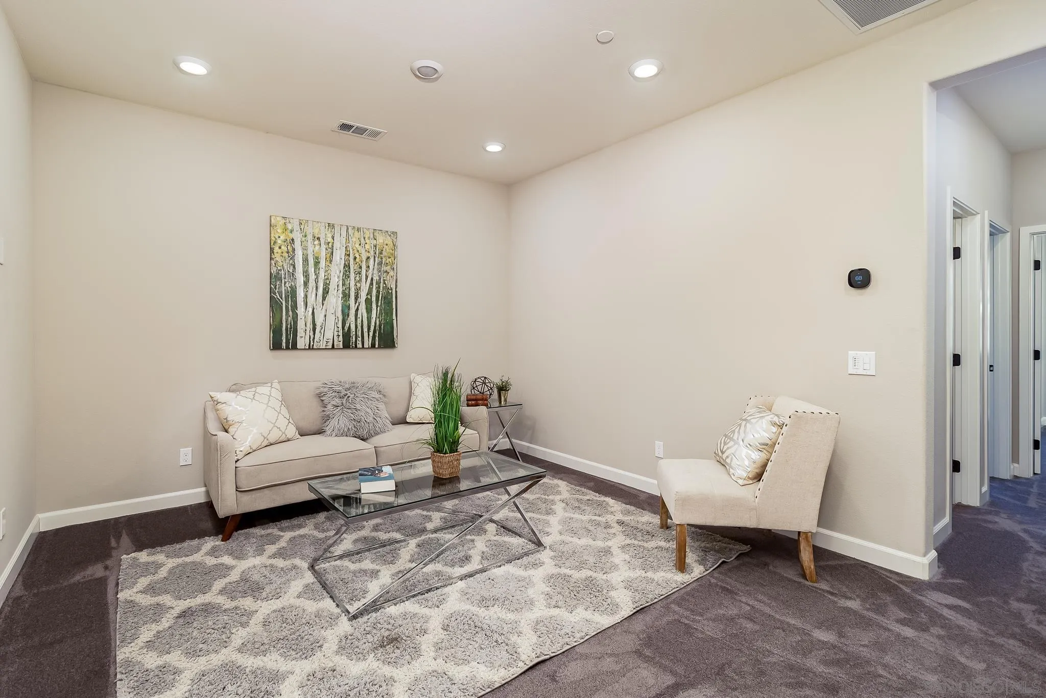 1094 Delpy View Point Vista, CA 92084 - Photo 11 of 43 a living room with furniture and a rug