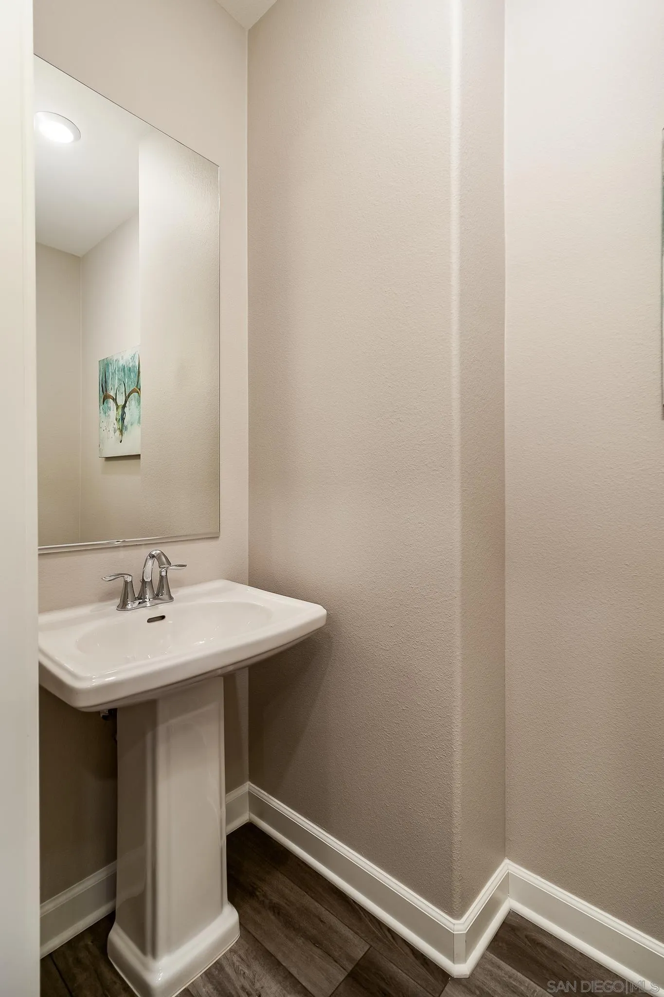 1094 Delpy View Point Vista, CA 92084 - Photo 12 of 43 a bathroom with a sink and a mirror