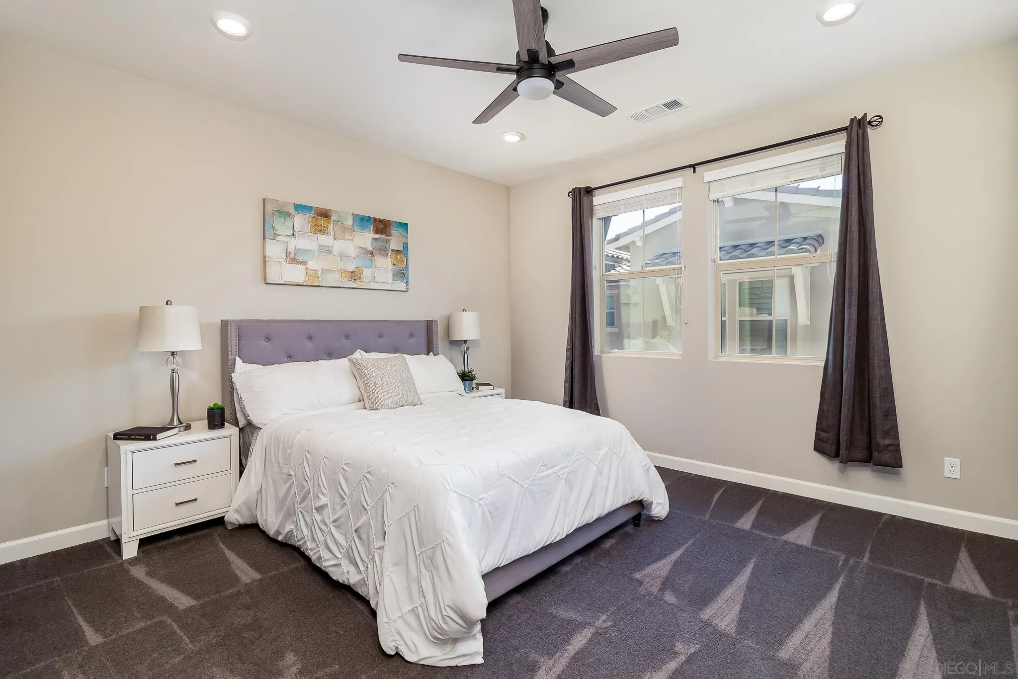 1094 Delpy View Point Vista, CA 92084 - Photo 13 of 43 a bedroom with a large bed and a window