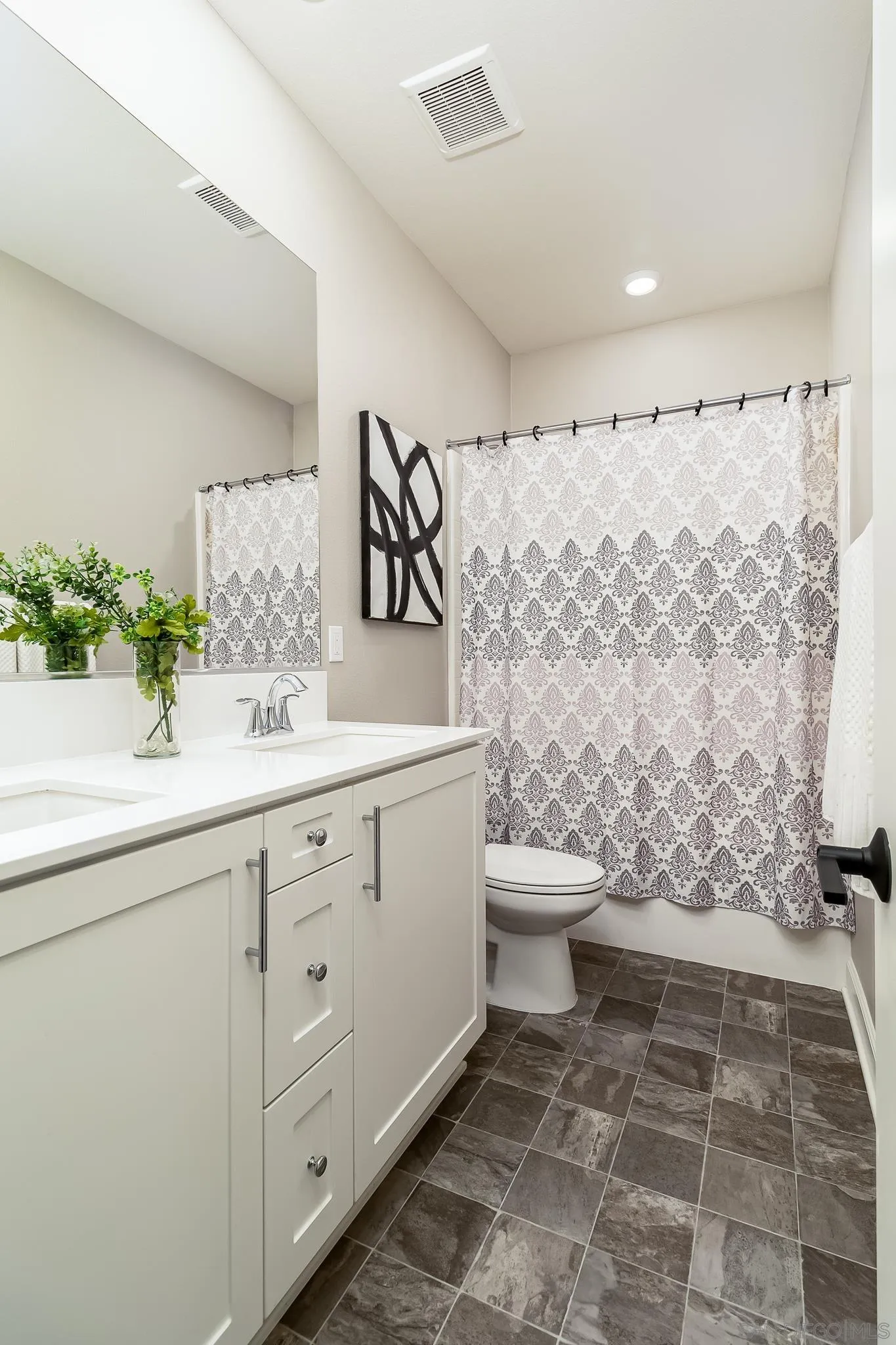 1094 Delpy View Point Vista, CA 92084 - Photo 19 of 43 a bathroom with a sink toilet and shower