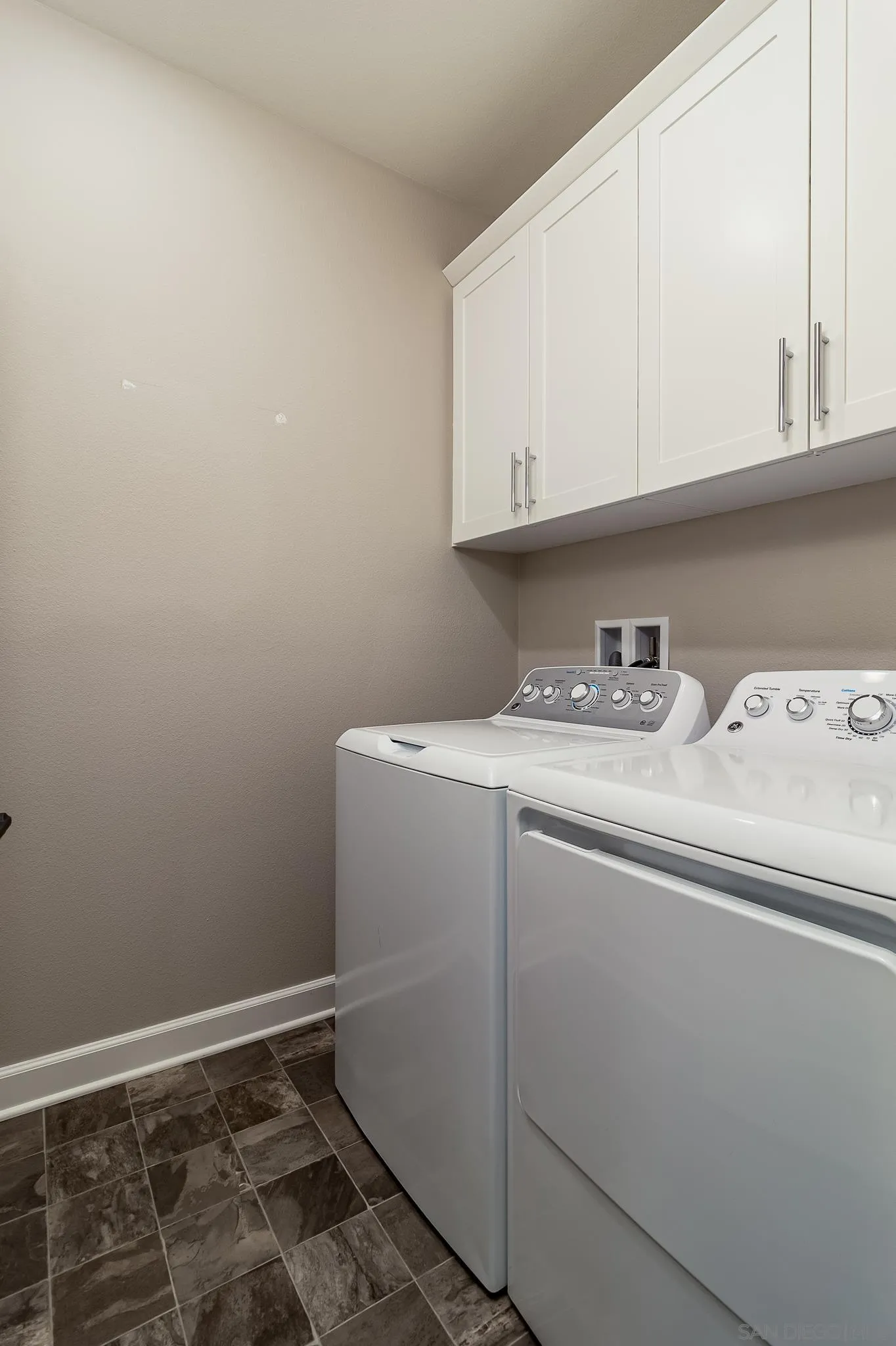 1094 Delpy View Point Vista, CA 92084 - Photo 21 of 43 a utility room with dryer and washer