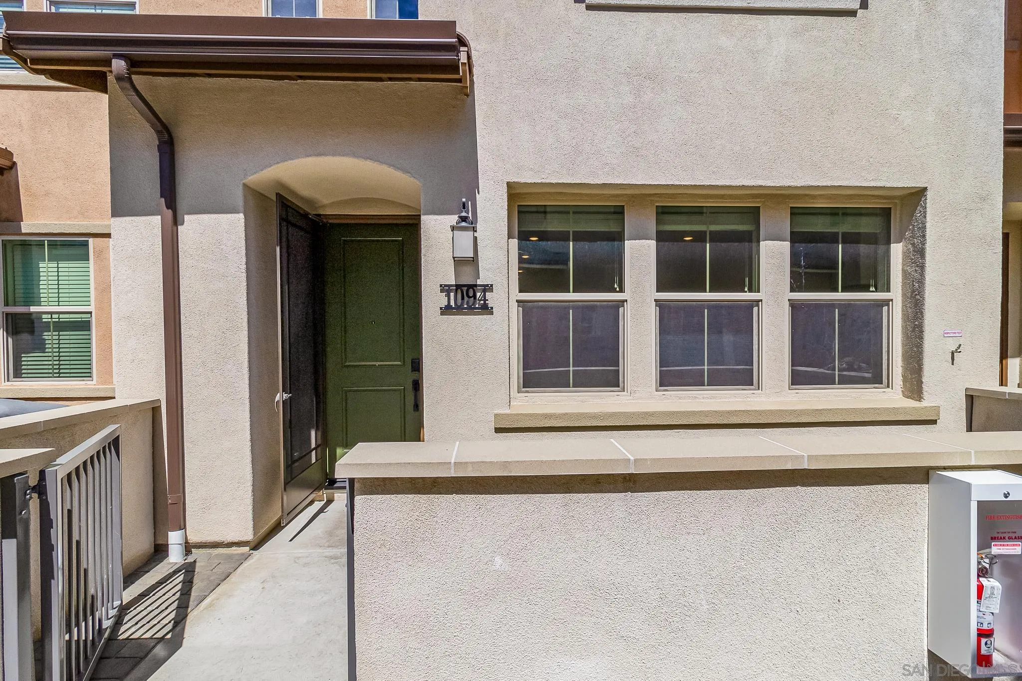 1094 Delpy View Point Vista, CA 92084 - Photo 25 of 43 a view of front door of house