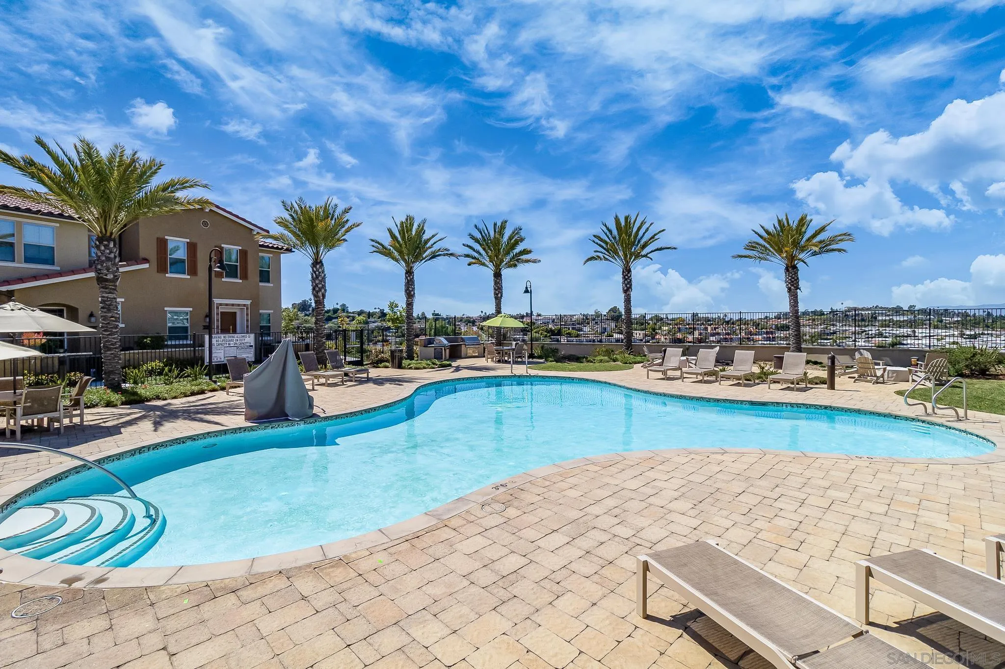 1094 Delpy View Point Vista, CA 92084 - Photo 32 of 43 a swimming pool with outdoor seating and yard
