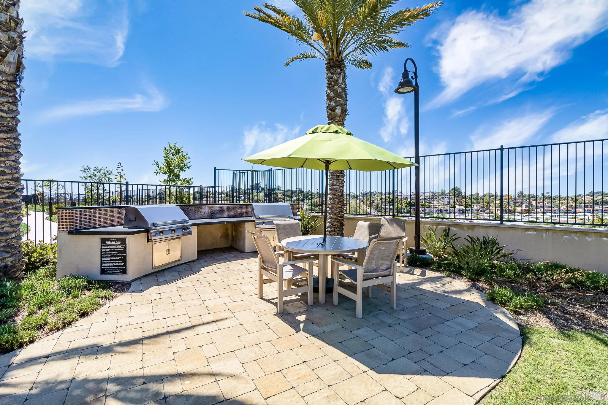 1094 Delpy View Point Vista, CA 92084 - Photo 35 of 43 a patio with table and chairs