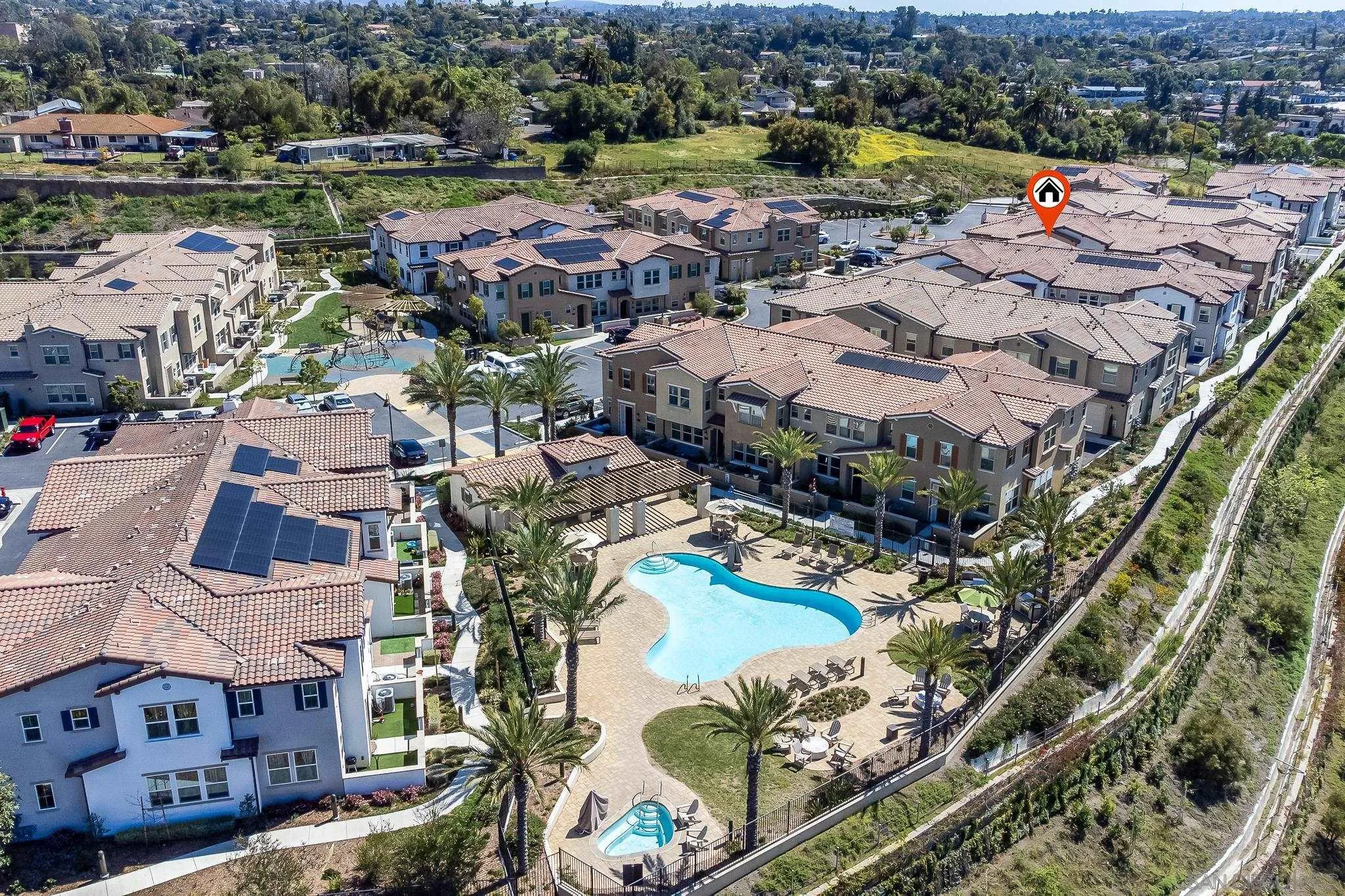 1094 Delpy View Point Vista, CA 92084 - Photo 41 of 43 an aerial view of a city with lots of residential buildings ocean and mountain view in back