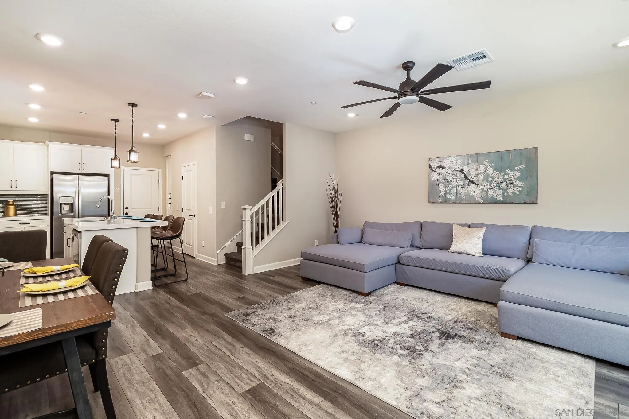 1094 Delpy View Point Vista, CA 92084 - Photo 5 of 43 a living room with furniture and kitchen view