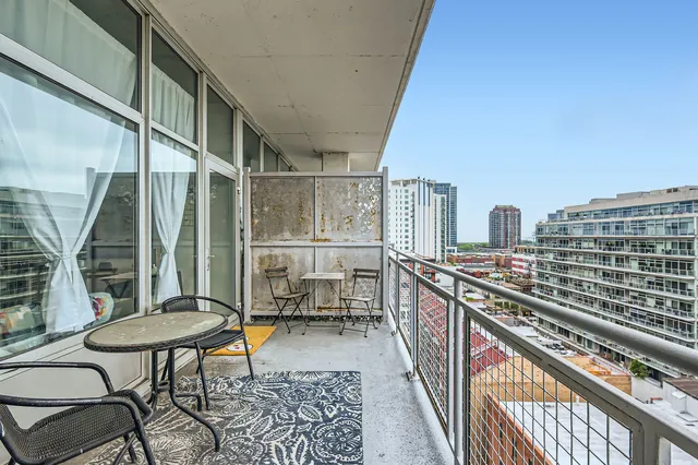 a view of a city with tall buildings