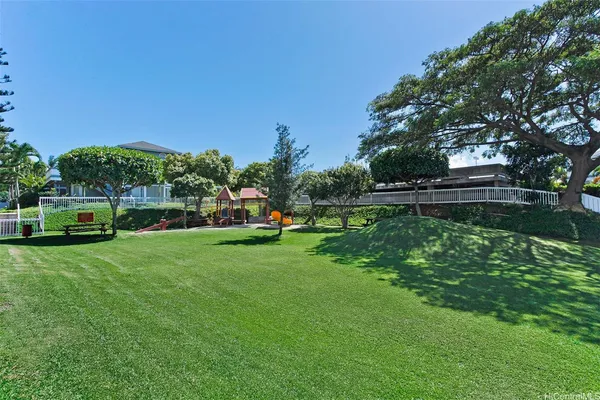 a view of a garden with houses