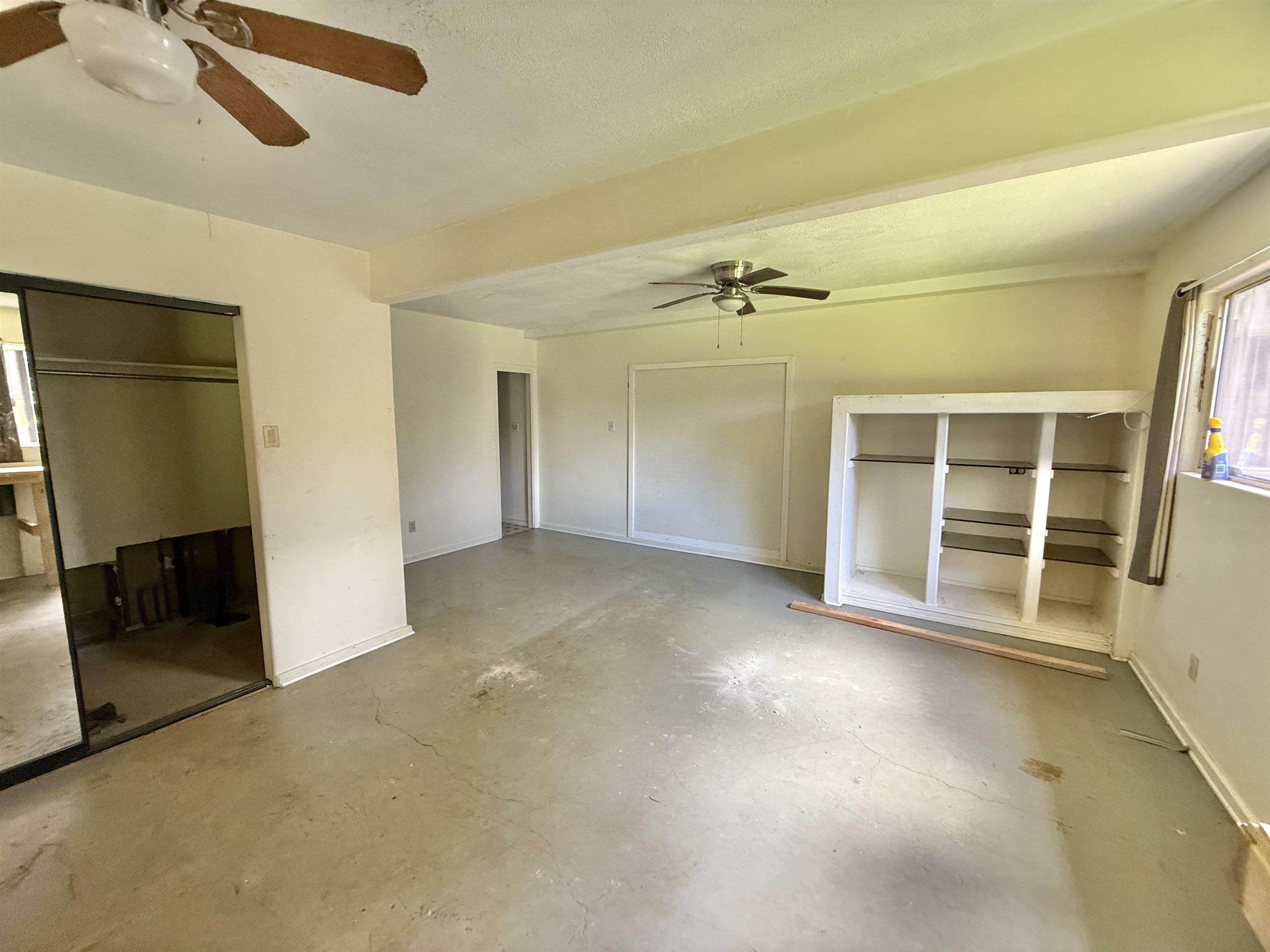 1630 Kauhikoa Road Haiku, HI 96708 - Photo 40 of 48 an empty room with windows
