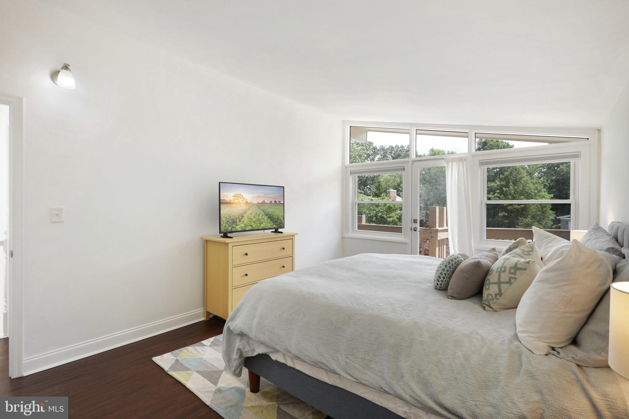 6706 Maxalea Road Baltimore, MD 21239 - Photo 22 of 36 Primary Bedroom Opens to a Deck