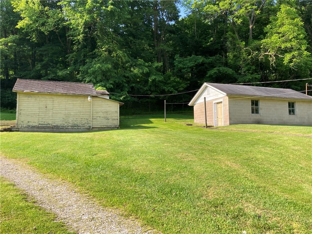 810 Pleasant View Smock Road Smock, PA 15480 - Photo 2 of 12 a view of a back yard of the house