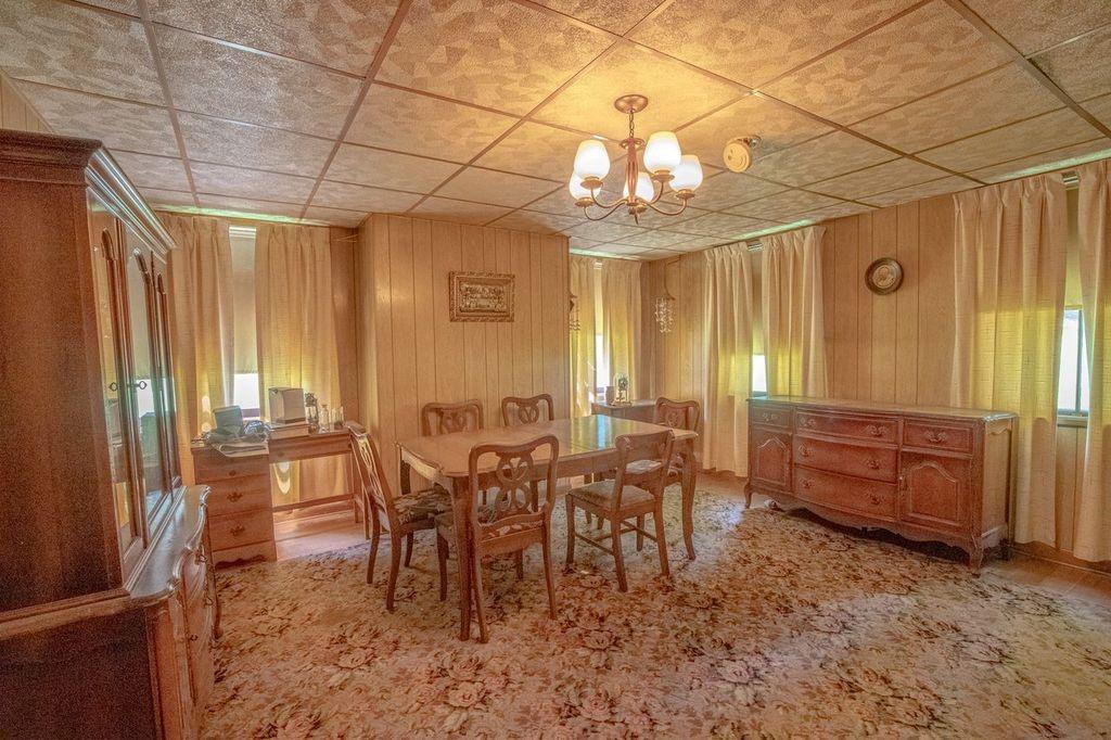 810 Pleasant View Smock Road Smock, PA 15480 - Photo 10 of 12 a view of a dining room with furniture window and outside view