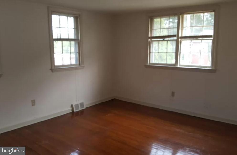 20 B St Albans Avenue Newtown Square, PA 19073 - Photo 11 of 13 an empty room with a window