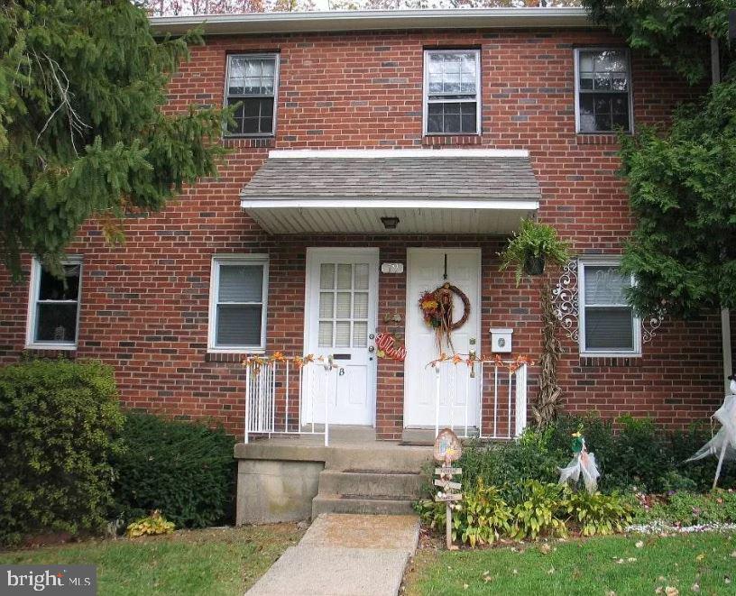20 B St Albans Avenue Newtown Square, PA 19073 - Photo 3 of 13 a front view of a house with garden