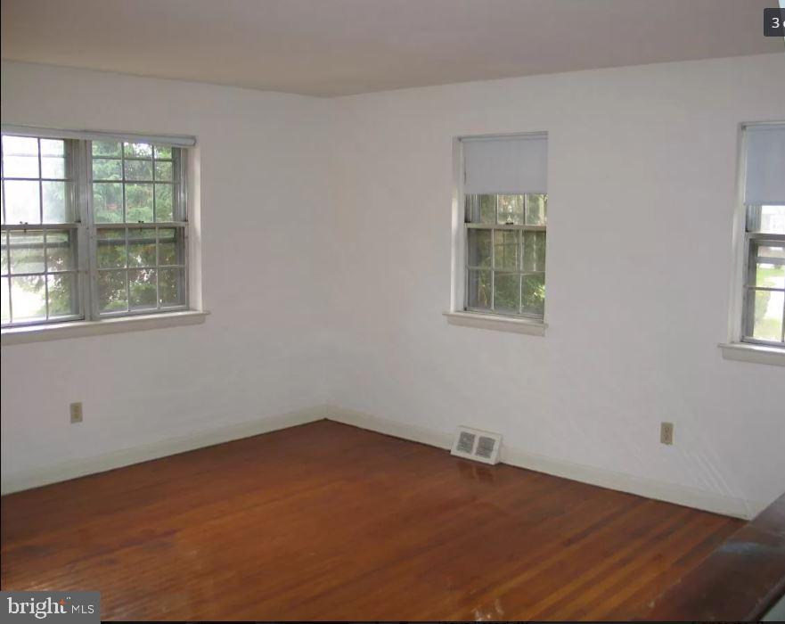 20 B St Albans Avenue Newtown Square, PA 19073 - Photo 4 of 13 an empty room with a window