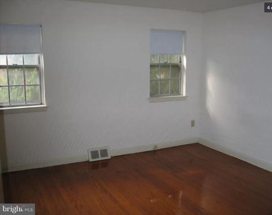 20 B St Albans Avenue Newtown Square, PA 19073 - Photo 5 of 13 an empty room with a window
