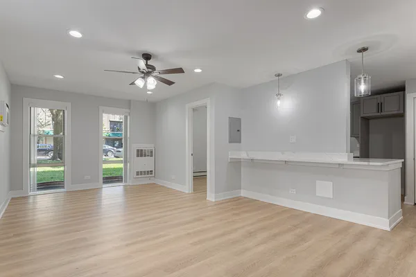 a view of an empty room and window