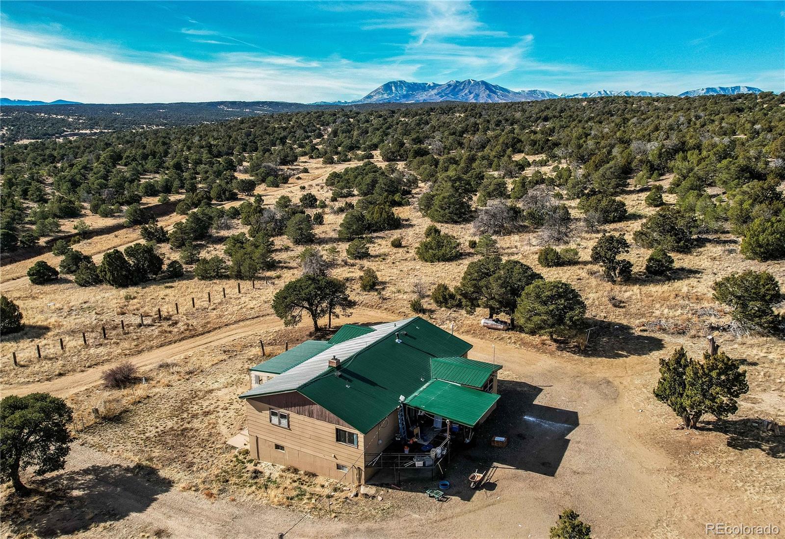 952 Twin Lakes Road Walsenburg, CO 81089 - Photo 14 of 47 an aerial view of a house with a yard